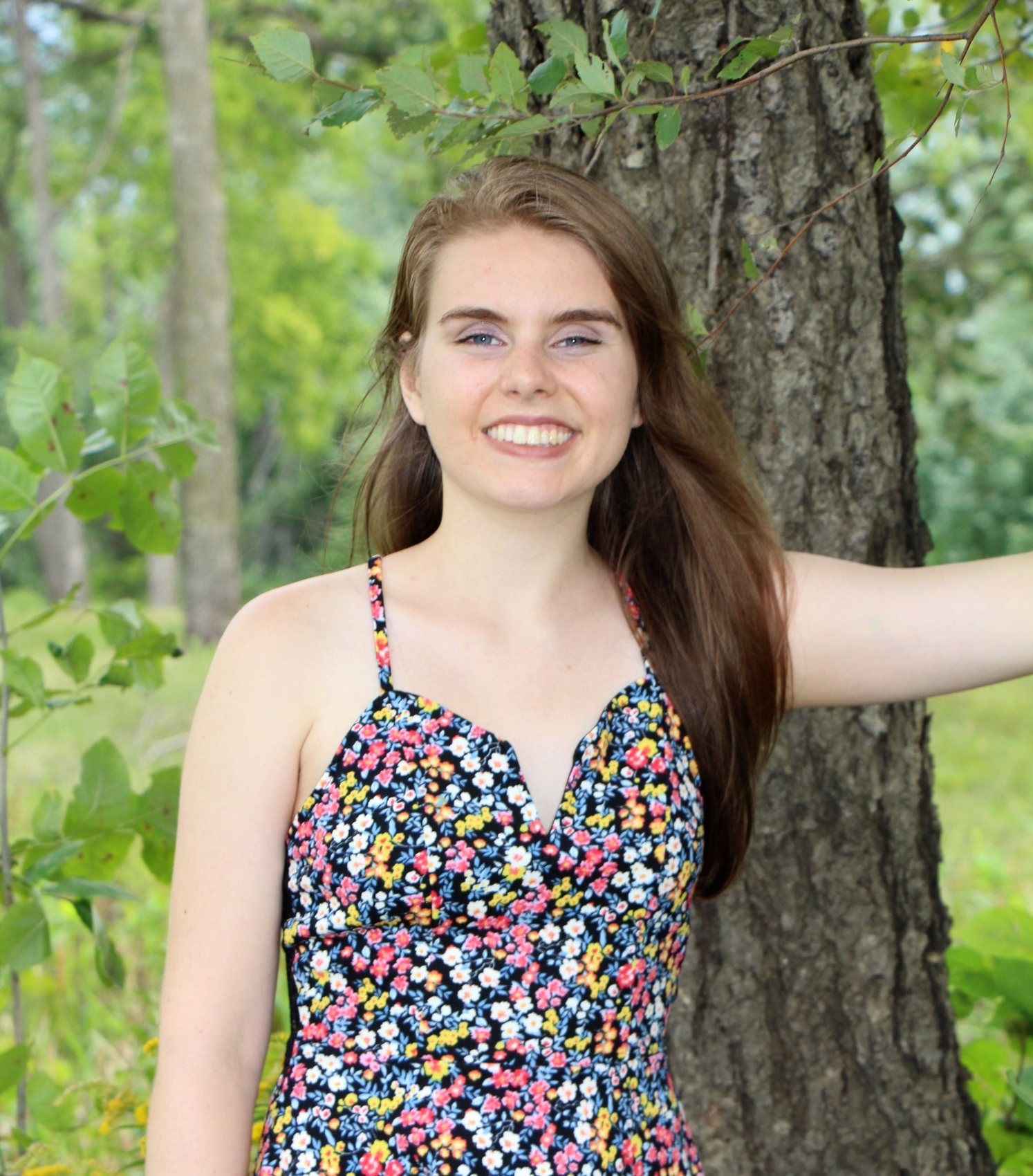 Abbi smiling in a senior portrait